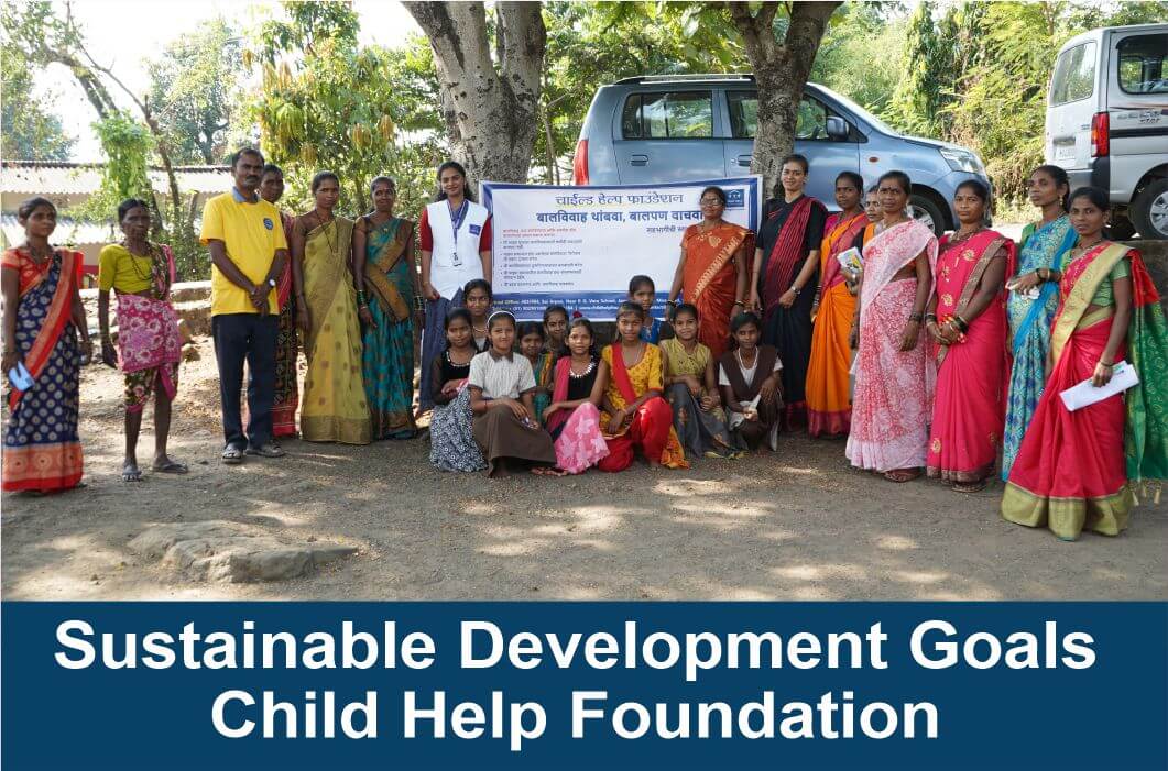 CHF Volunteers with a group of women and girls at Maharashtra village for child marriage awareness