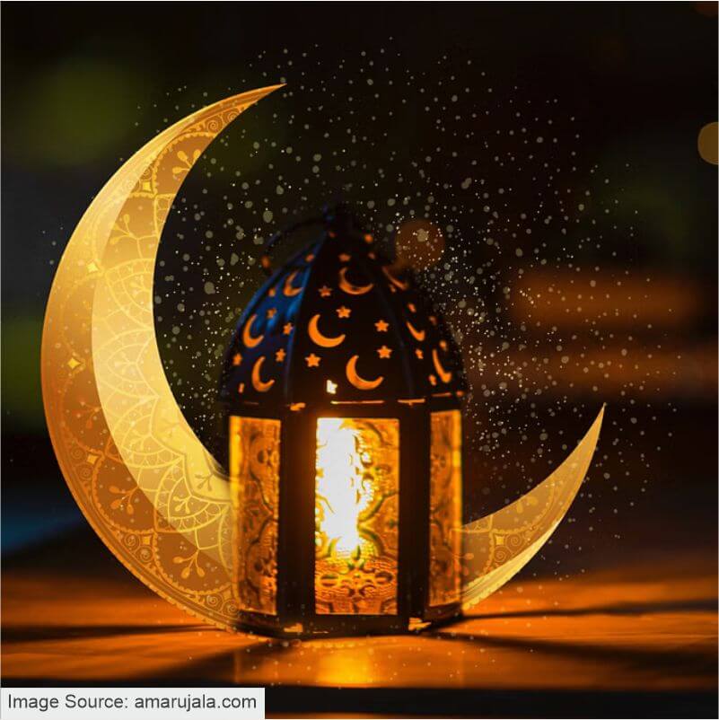 A photo of a lamp and a crescent moon with golden light