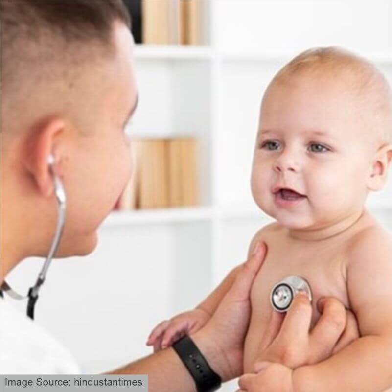 A doctor checking up on an infant