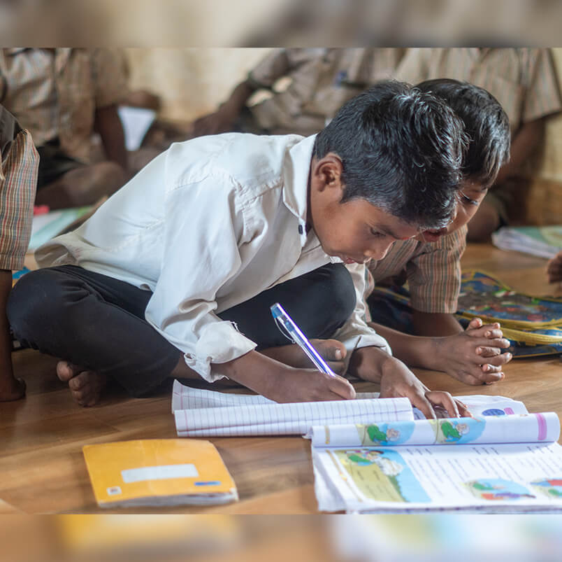 Students from Government Ashram School studying