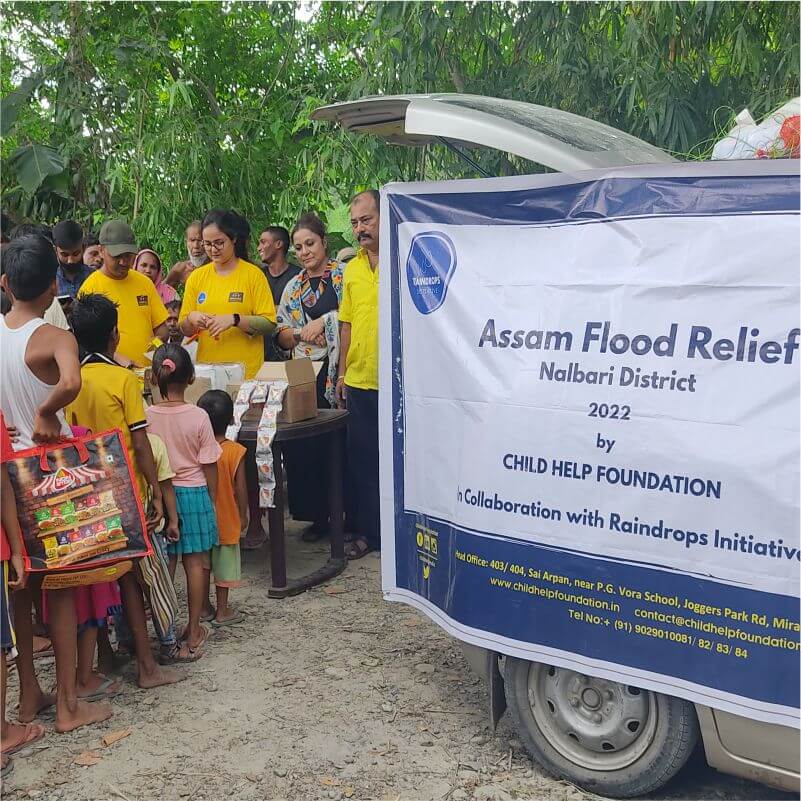  CHF distributing aid to Assam flood victims.